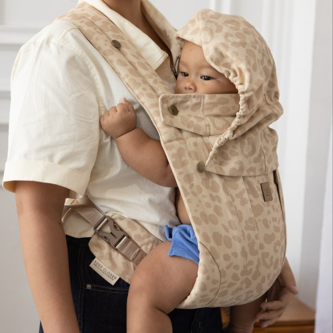 Sand Leopard Lite carrier worn on the front
